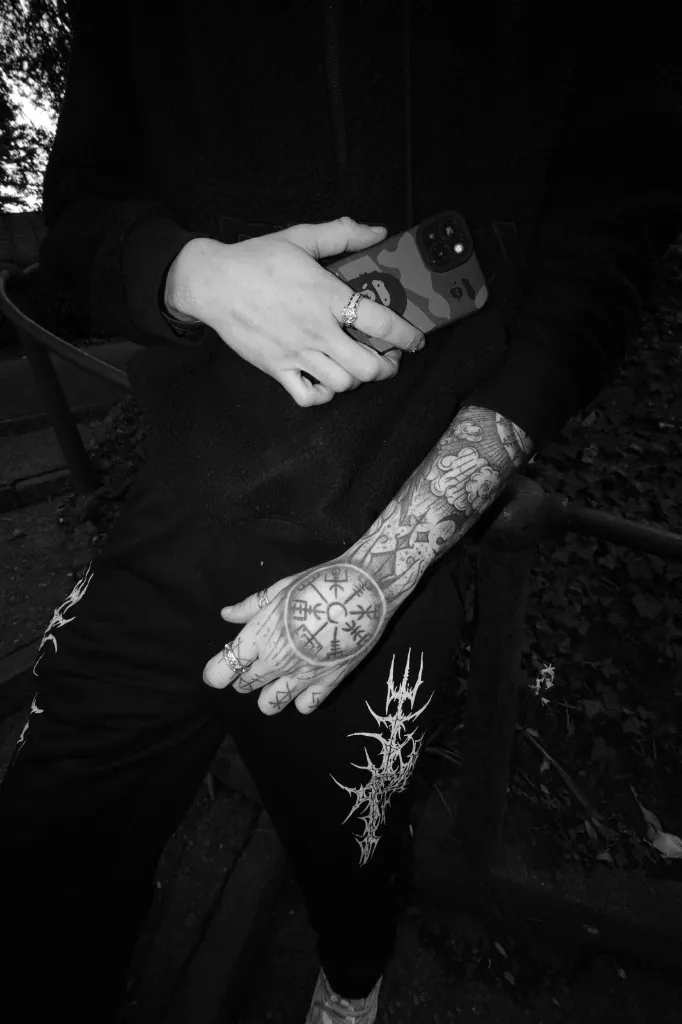 Duarte’s sleeve tattoo, rings and the graphic on his trousers